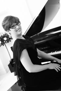 Corinne March Concert Pianist and Multi Instrumentalist